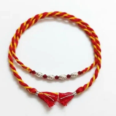 Diamond-Cut Ruby & 92.5 Silver Textured Beads Elegant Rakhi | Kanha Ji Jewels